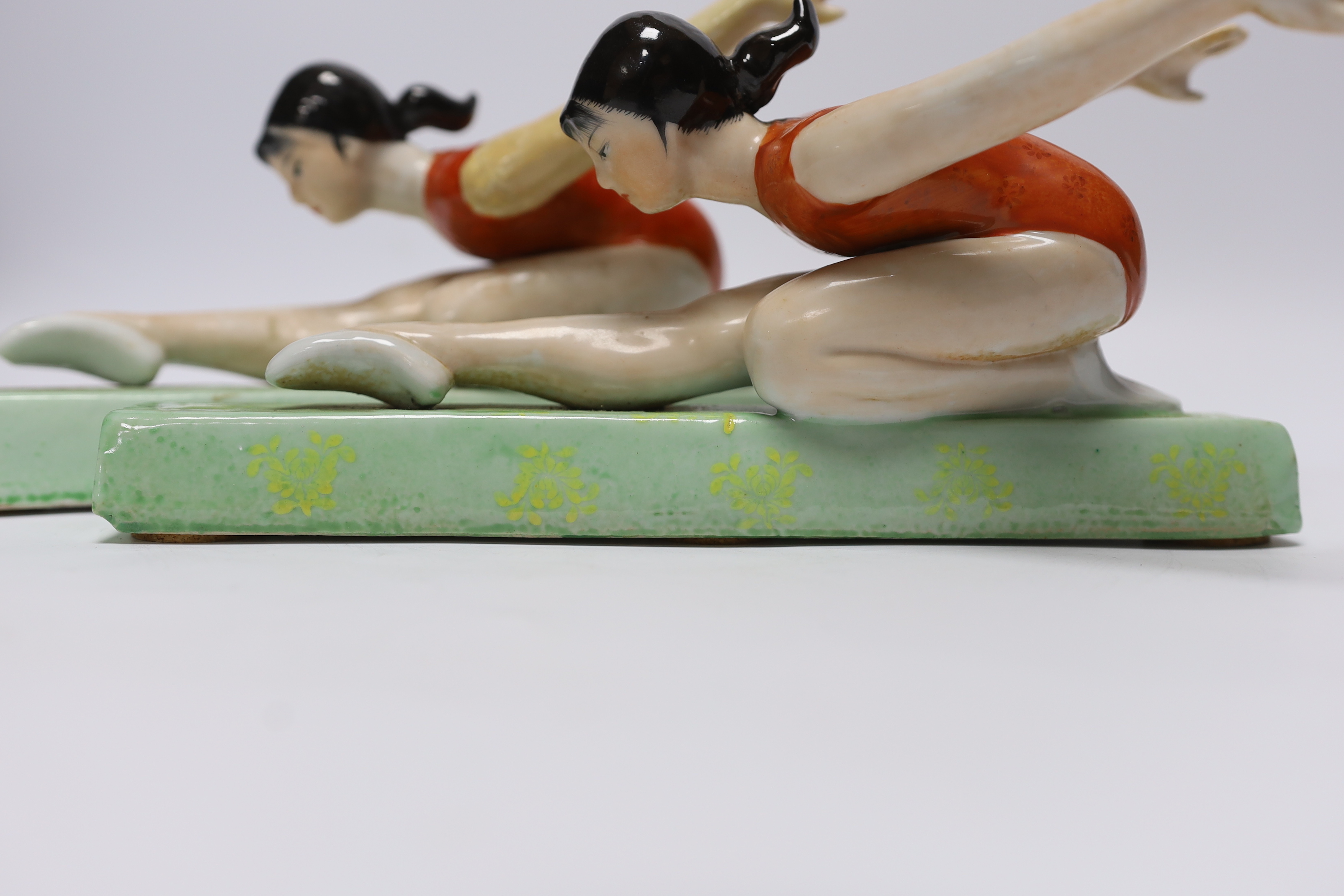 A pair of Chinese Cultural Revolution figures of ballerinas, 23.5cm long